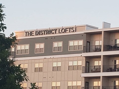 a large building with the district lodges on top of it