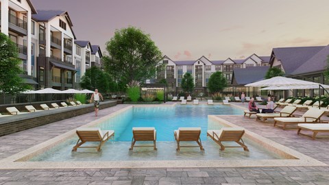 A pool surrounded by lounge chairs and umbrellas in front of apartment buildings.