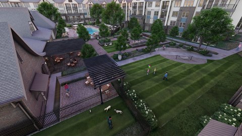 A large grassy area with people playing soccer.