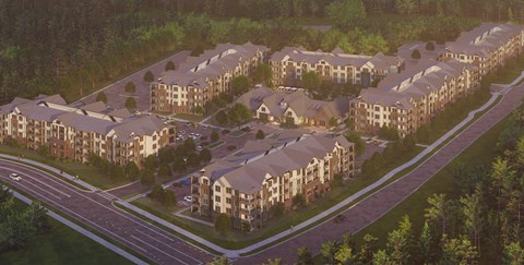 A large housing development with a road running through it.