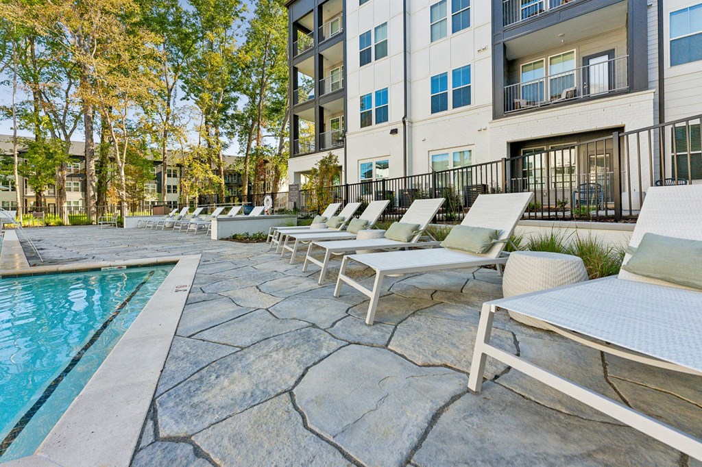 our apartments have a large pool and lounge chairs