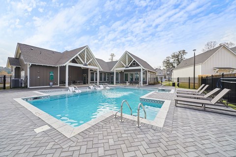 Resort-style pool with sundeck  at Turnberry Park Apartments in Gardendale, AL