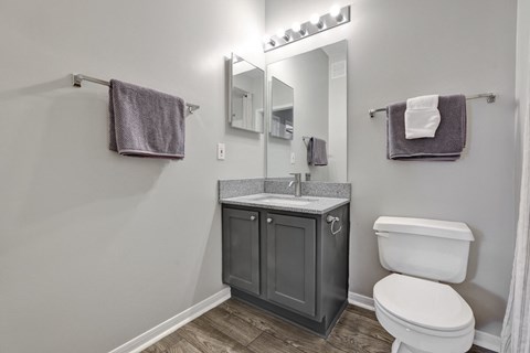 A bathroom with a towel rack at Village at Caldwell Apartments in Birmingham, AL
