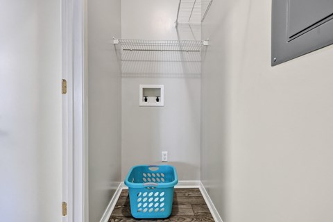 Laundry room at Village at Caldwell Mill Apartments in Birmingham, AL