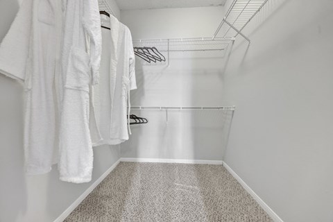 walk-in closet at Village at Caldwell apartments in Birmingham, AL