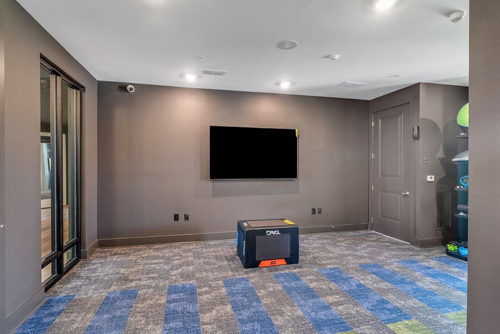 yoga studio with TV at Tapestry Overbrook in McDonough, Georgia