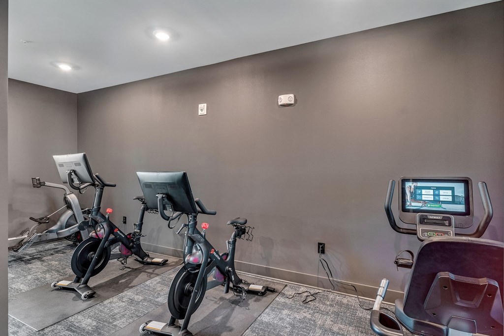yoga studio and spin bikes at Tapestry Overbrook in McDonough, Georgia