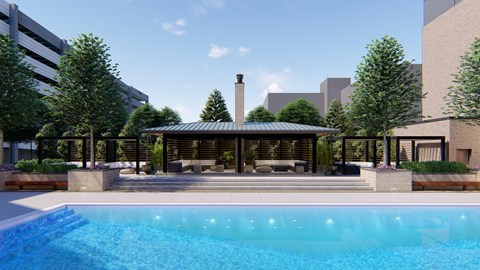 A pool with a building in the background.