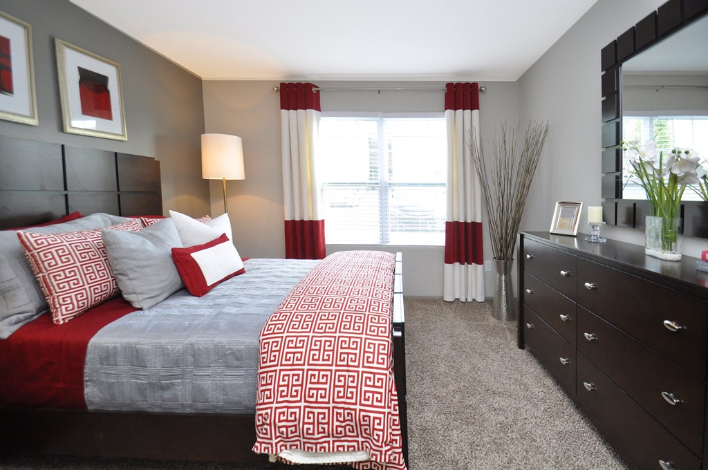 Bedroom interior with cozy bed at The Metropolitan, Kentucky