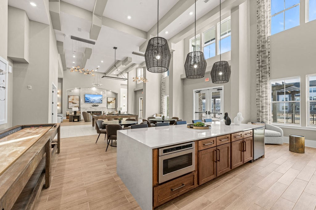 the kitchen is open to the dining room and living room