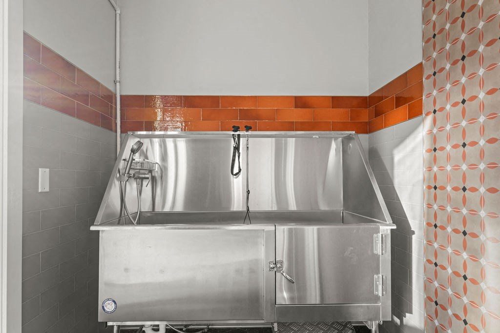 a stainless steel commercial refrigerator in a kitchen