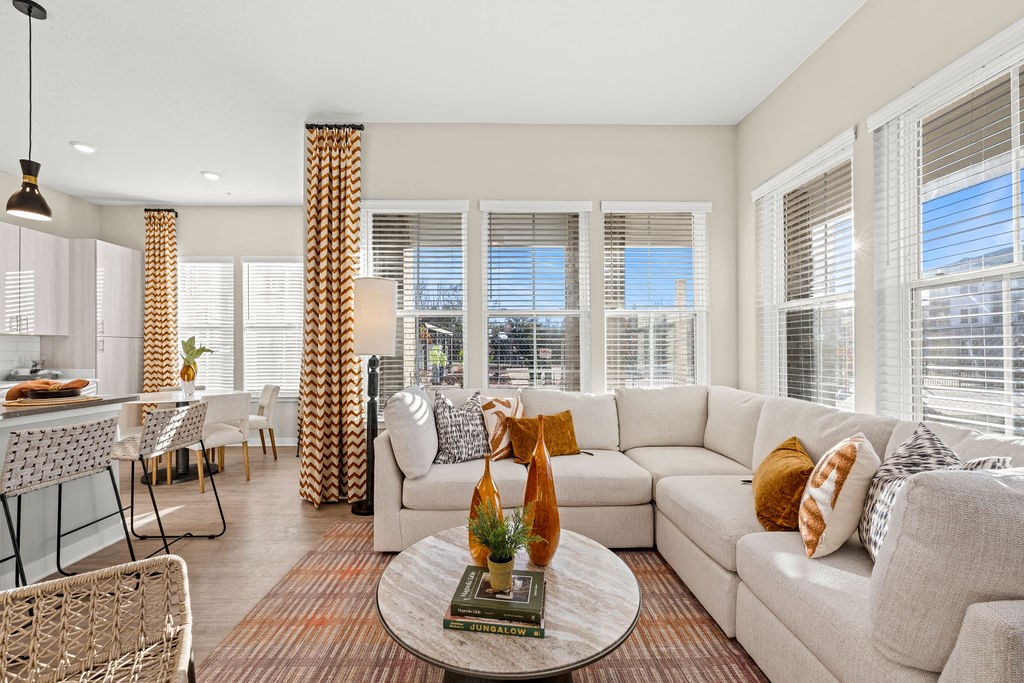 a living room with a couch and a table