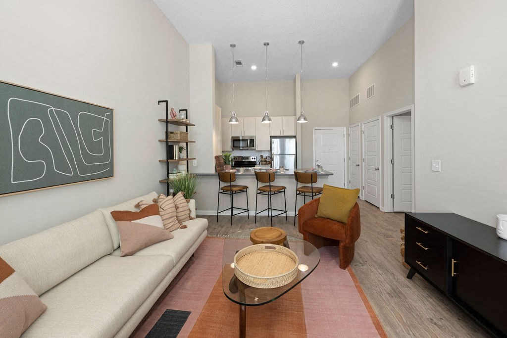 a living room with a couch and a table
