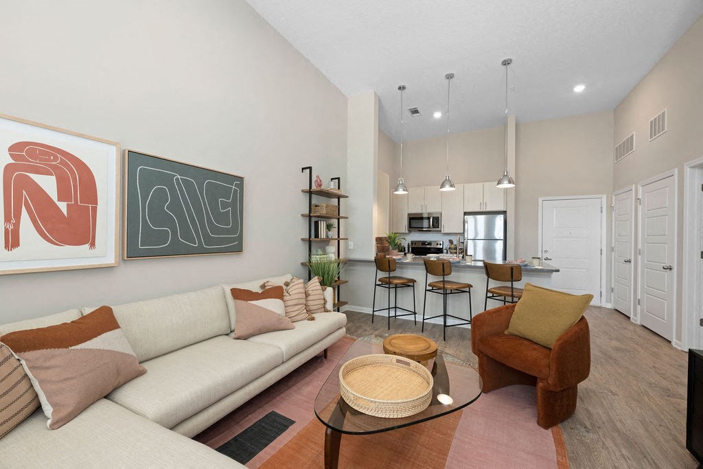 a living room with a couch and a table