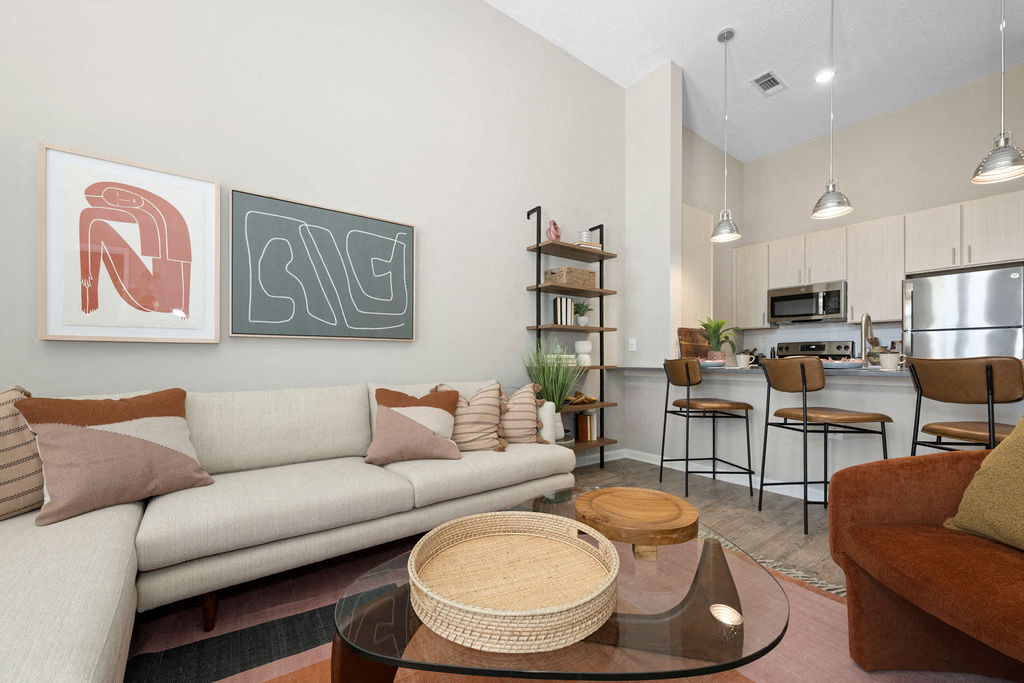 a living room with a couch and a table