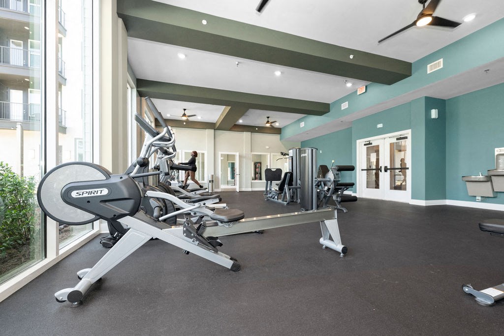 the gym at the flats at big tex apartments