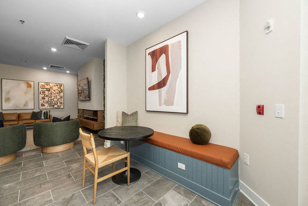 a living room with a couch and a table