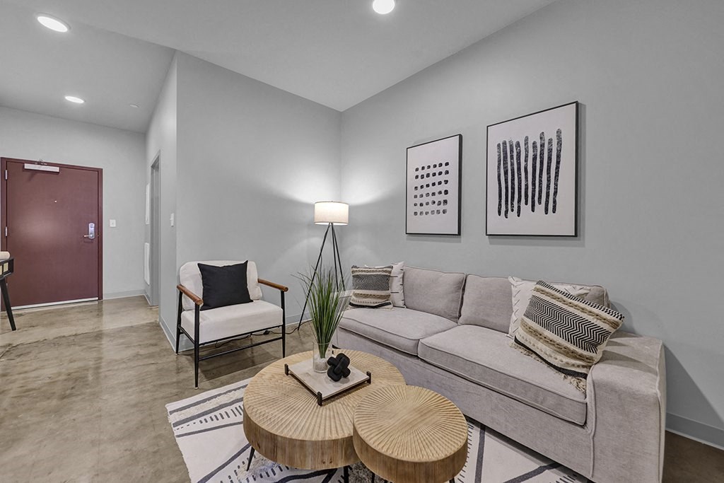 a living room with a couch and a table