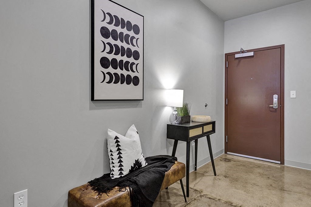 a living room with a couch and a table