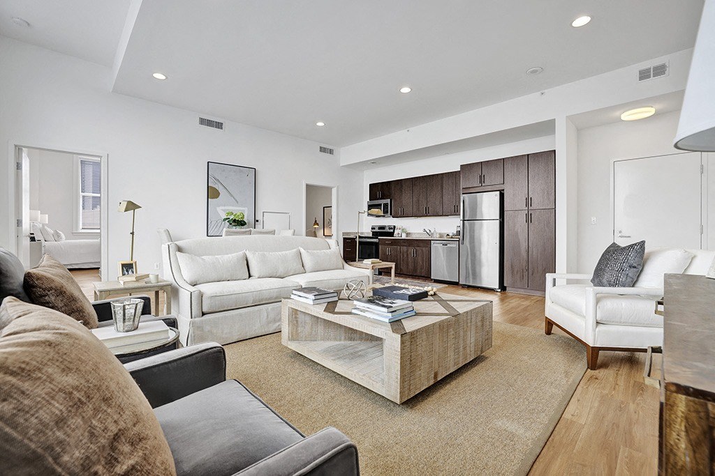 a living room with couches and a coffee table