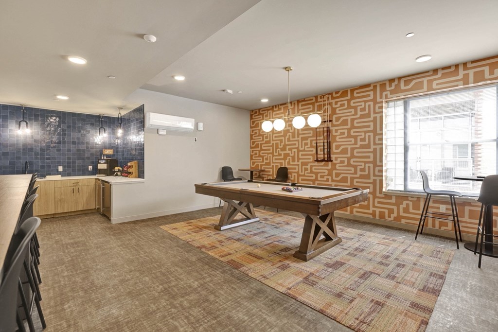 Downtown Birmingham, AL Apartments - Market Lofts On Third - Resident Lounge With WiFi, Coffee Bar, Billiards, And Seating Areas