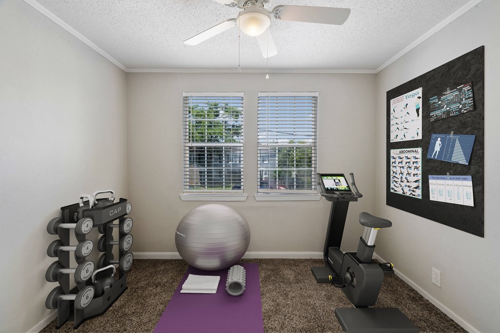 flexible living spaces  Living Room with wood flooring at Midtown Oaks Townhomes in Mobile, AL