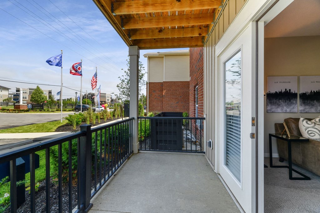 the preserve at ballantyne commons balcony view with balcony railings and flags