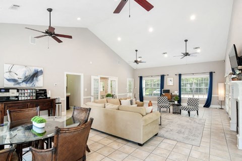 a living room with a couch and a table