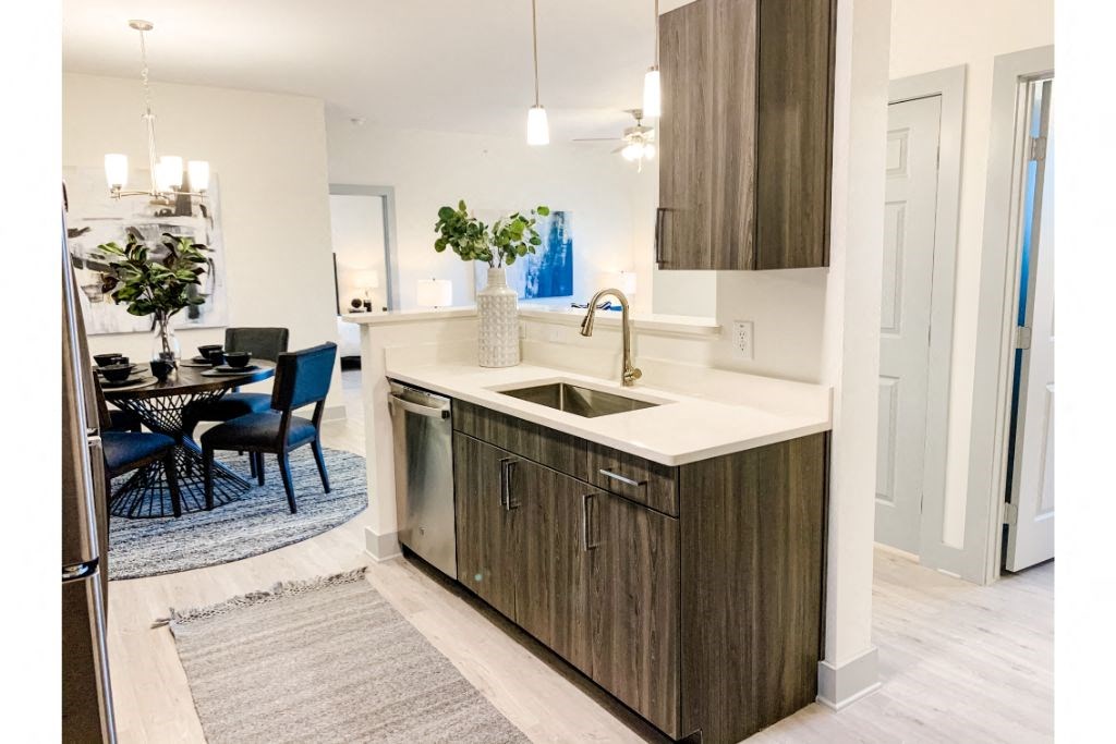 a kitchen with a sink and a dishwasher