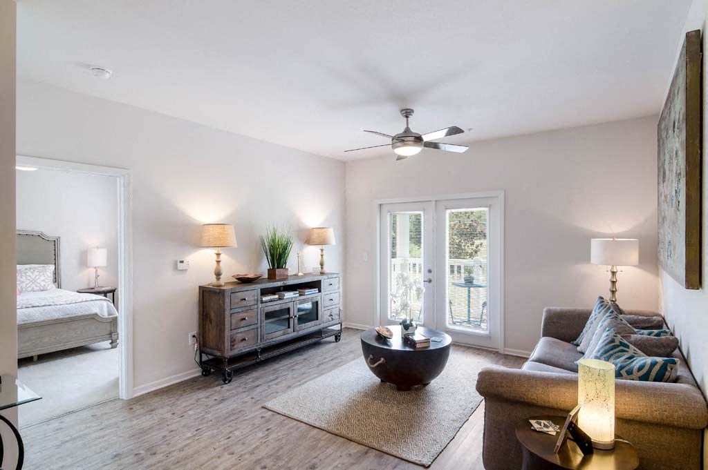 a living room with a couch and a table