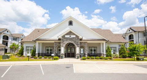 a large house with a driveway in front of it