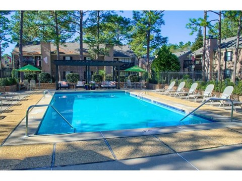 a swimming pool at at The Oakley at Hillcrest in Mobile, AL