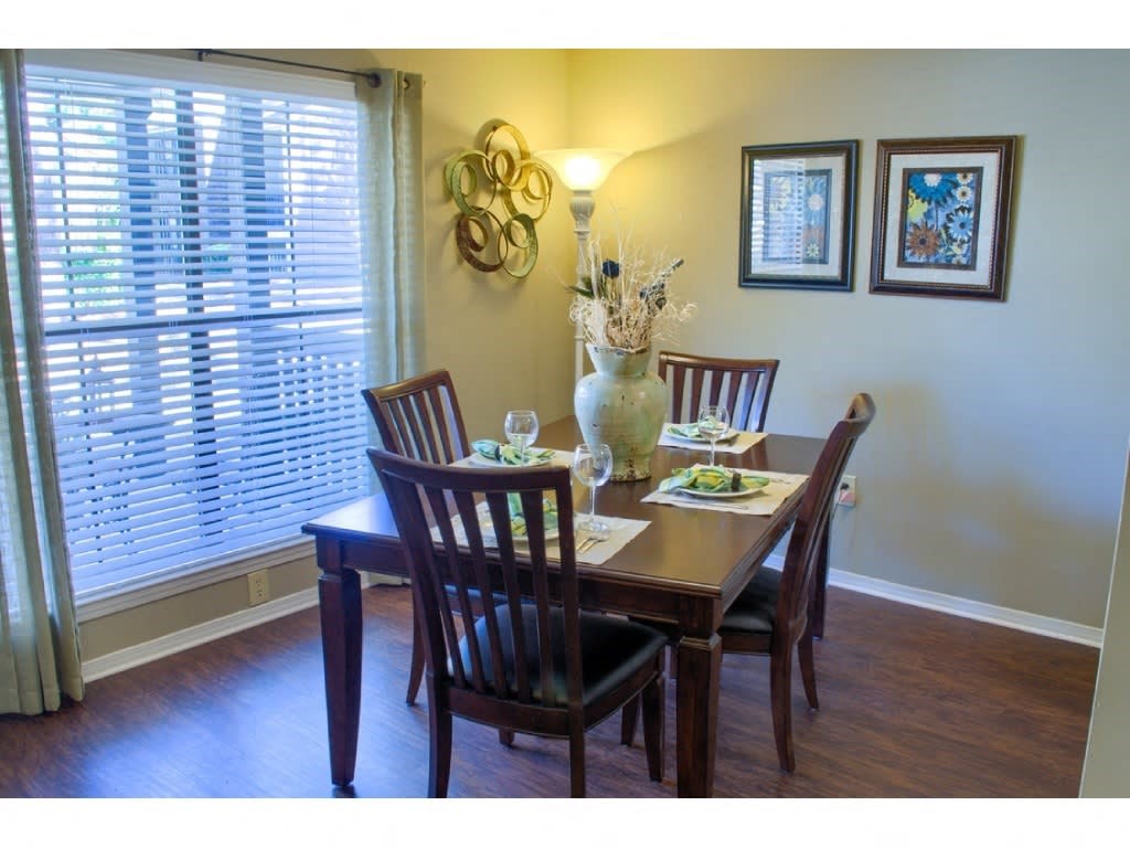 dining room with large window at Summit at at The Oakley at Hillcrest in Mobile, AL
