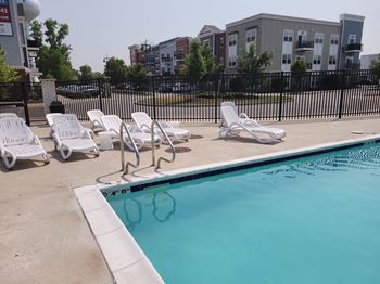 our swimming pool is next to an apartment building