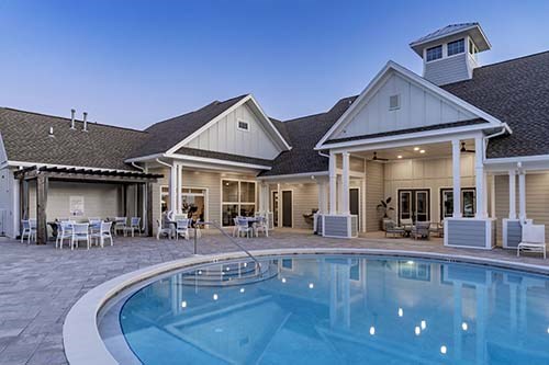 The Southern at Santa Rosa Beach Apartments in Santa Rosa Beach, Florida A large house with a pool in front.
