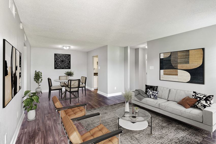spacious living room with wood plank flooring at Mirabelle Apartments in Mobile, Alabama large living room at Mirabelle Apartments in Mobile, Alabama - Photo Gallery