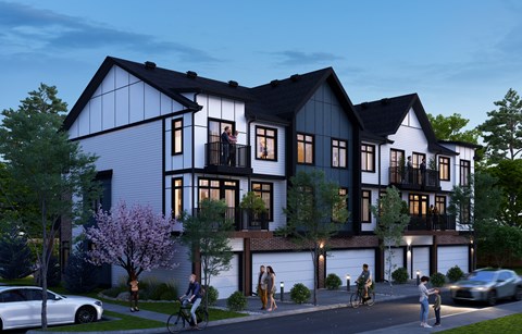 A modern house with a balcony and a garage.