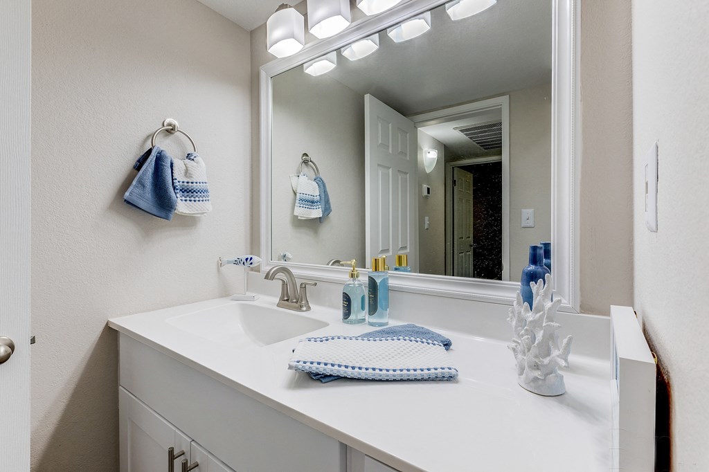 a bathroom with a sink and a mirror at Stonebridge, Phoenix, AZ, 85032