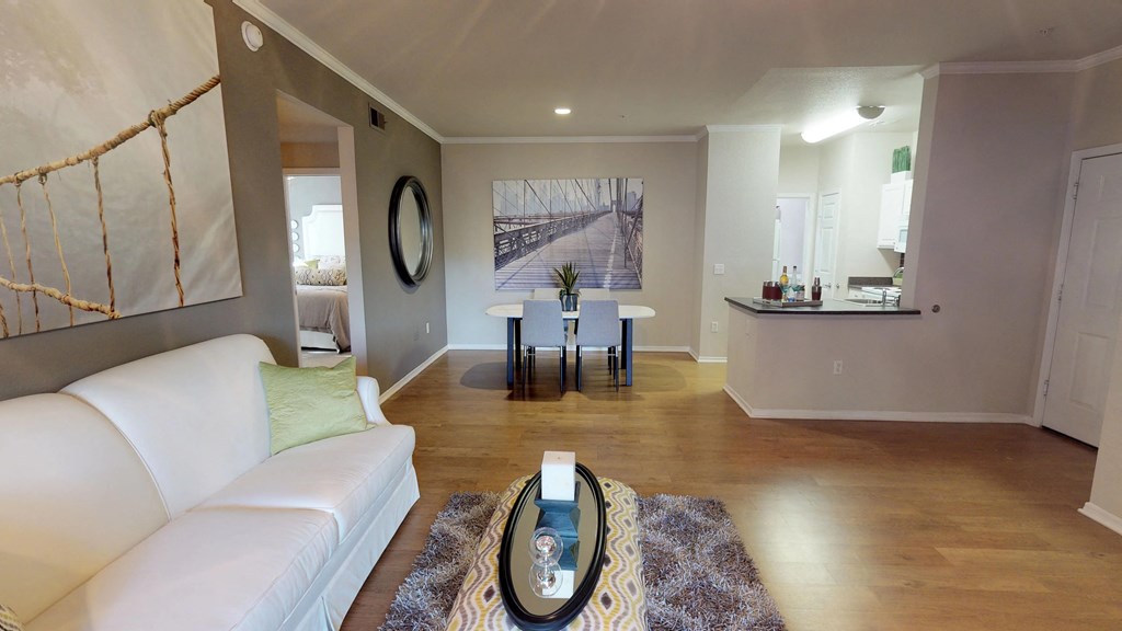 Living and dining area leading to kitchen with breakfast bar at SKY at p83, Arizona