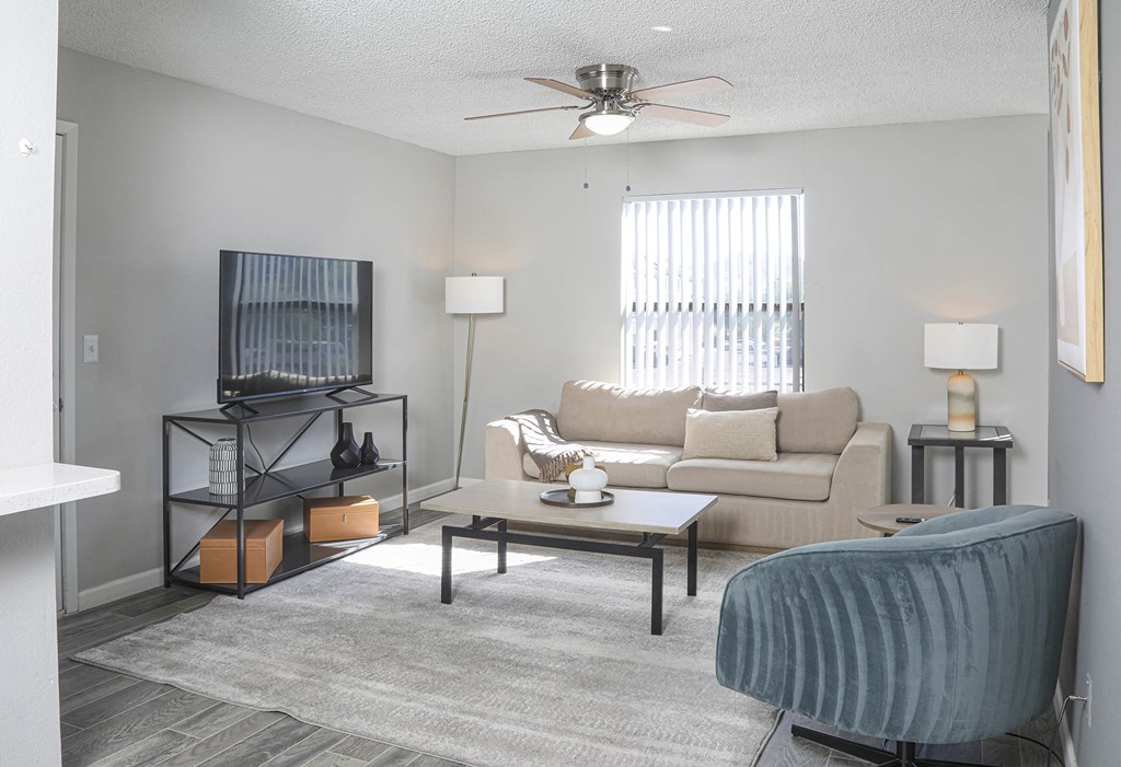 a living room with a couch and a coffee table