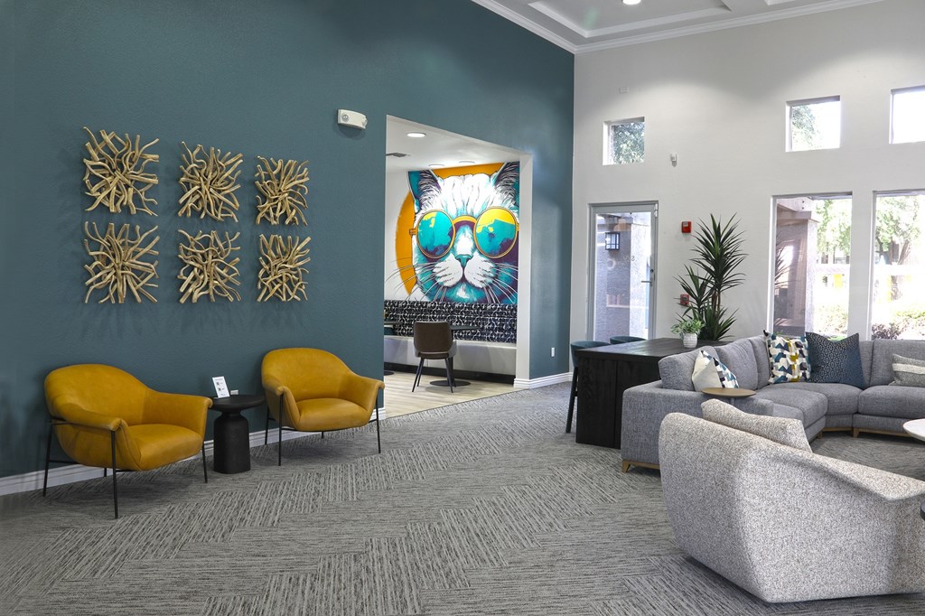 Rec room with couch and Tv and sitting chairs