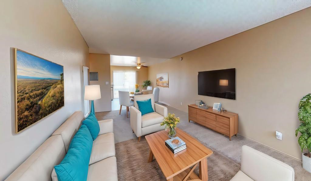a living room with a couch and a table