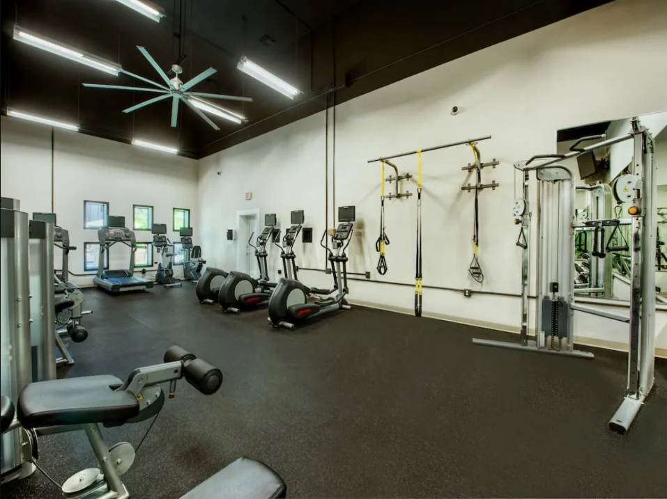 State-of-the-Art Fitness Center with Overhead Fan, Weights, and Cardio Equipment at Enclave at Paradise Valley, AZ 85032