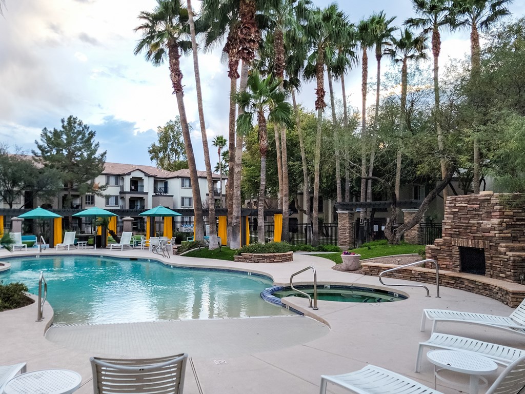 Swimming Pool and Spa View with a Cozy Fireplace by the Spa at Sky at P83, Peoria, AZ