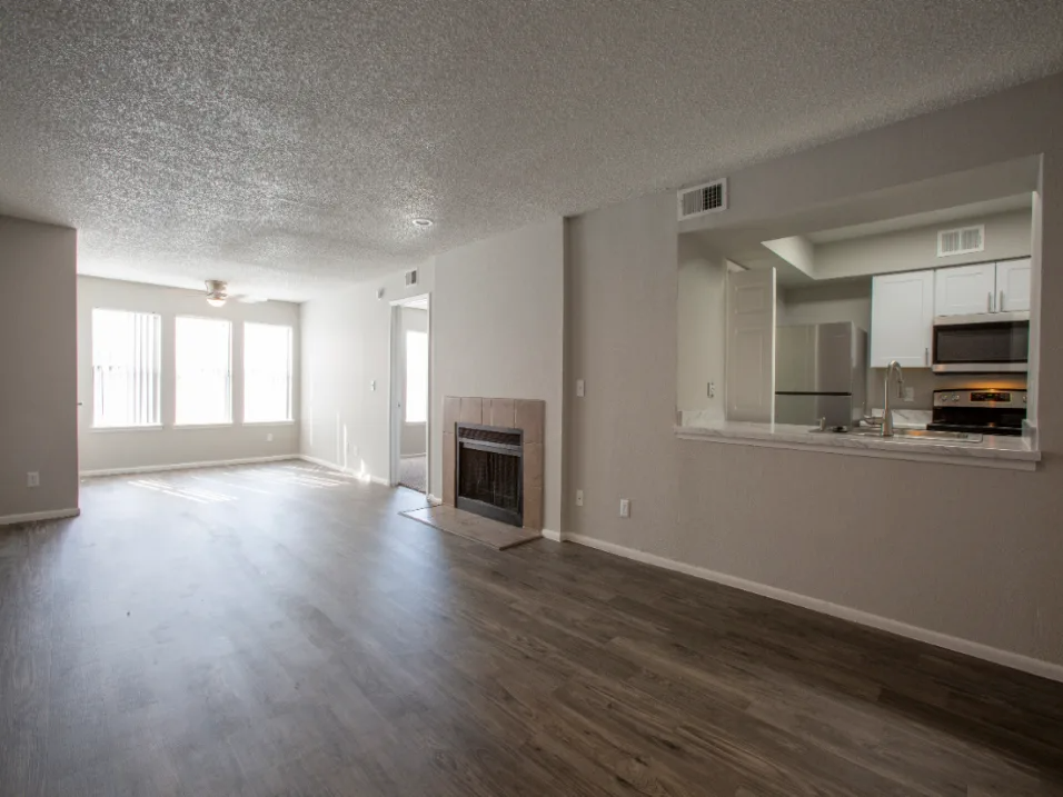 Stunning Living Space with Luxurious Plank Flooring and a Fireplace at Enclave at Paradise Valley, Phoenix, Arizona 85032