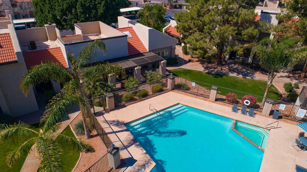 Aerial view of pool and green space surrounding pool area