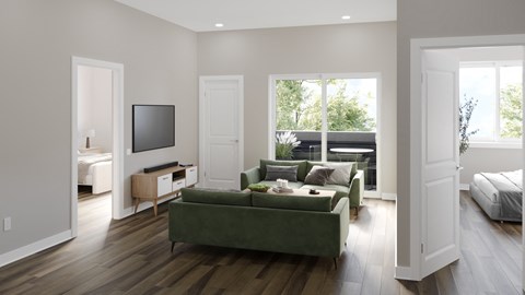 A living room with a green couch and a television.