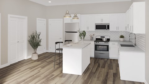 A modern kitchen with white cabinets and a wooden floor.