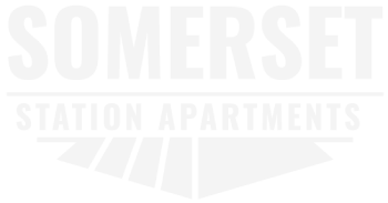 A black and white image of the Somerset Station Apartments logo.