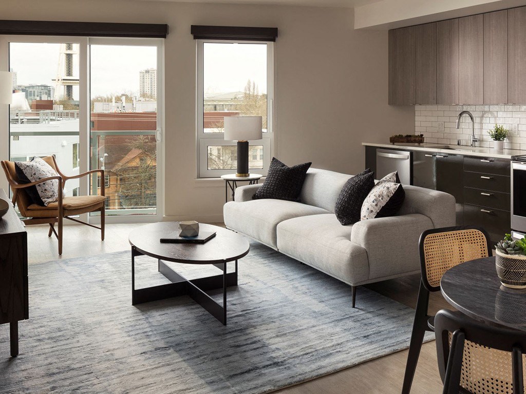 a living room with a couch and a table